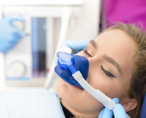 woman receiving sedation dentistry